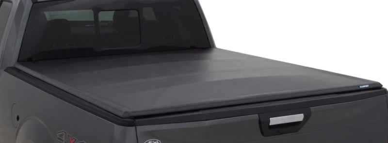 Lund 04-08 Ford F-150 (6.5ft. Bed) Genesis Tri-Fold Tonneau Cover - Black 95020